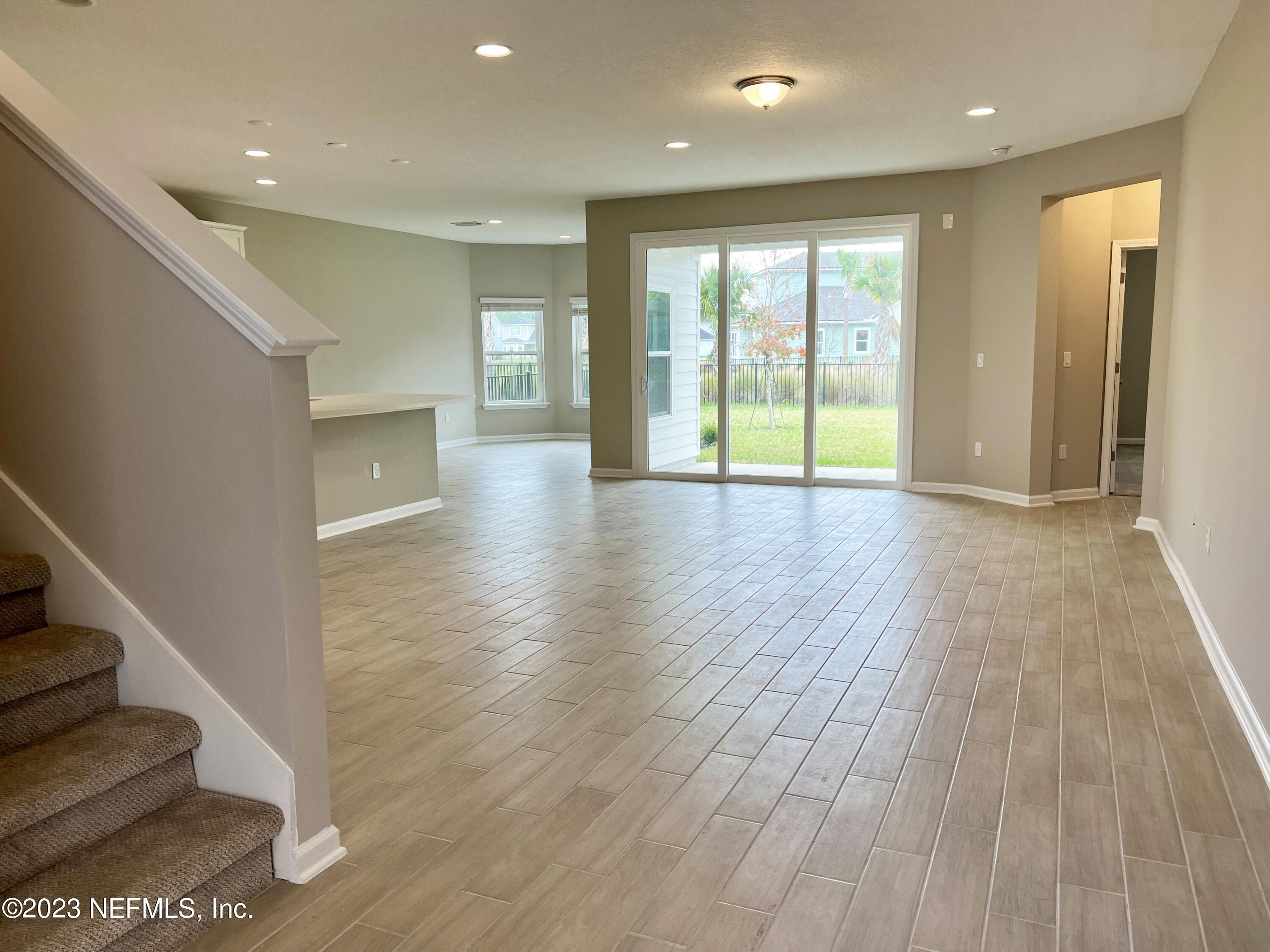 385 Brookgreen Way St. Augustine, FL 32092 - Photo 4 of 32 a view of an entryway with wooden floor