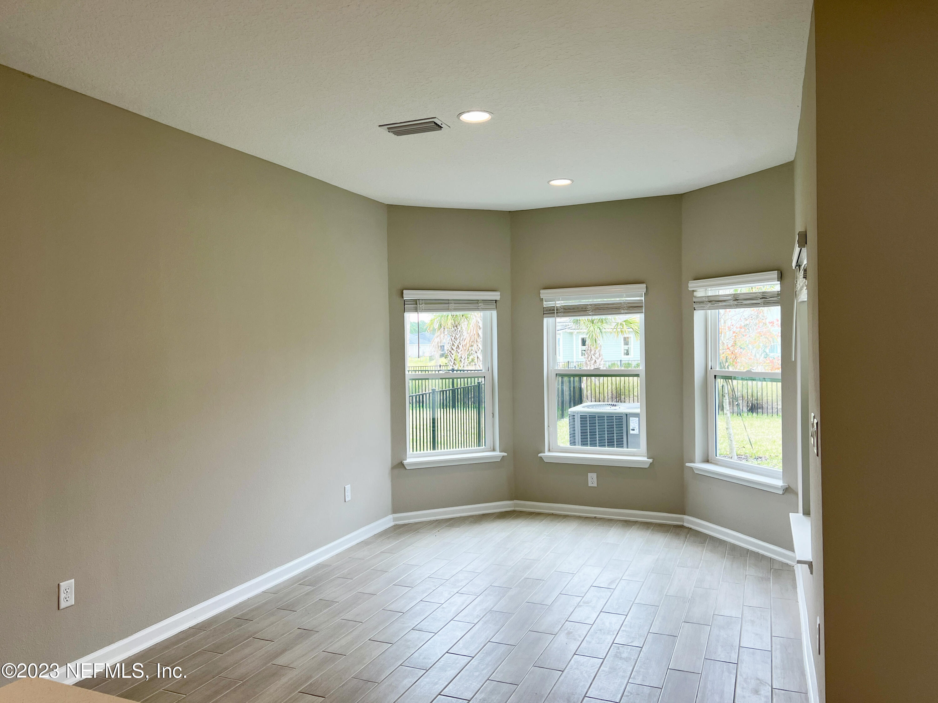385 Brookgreen Way St. Augustine, FL 32092 - Photo 8 of 32 a view of an empty room with a window