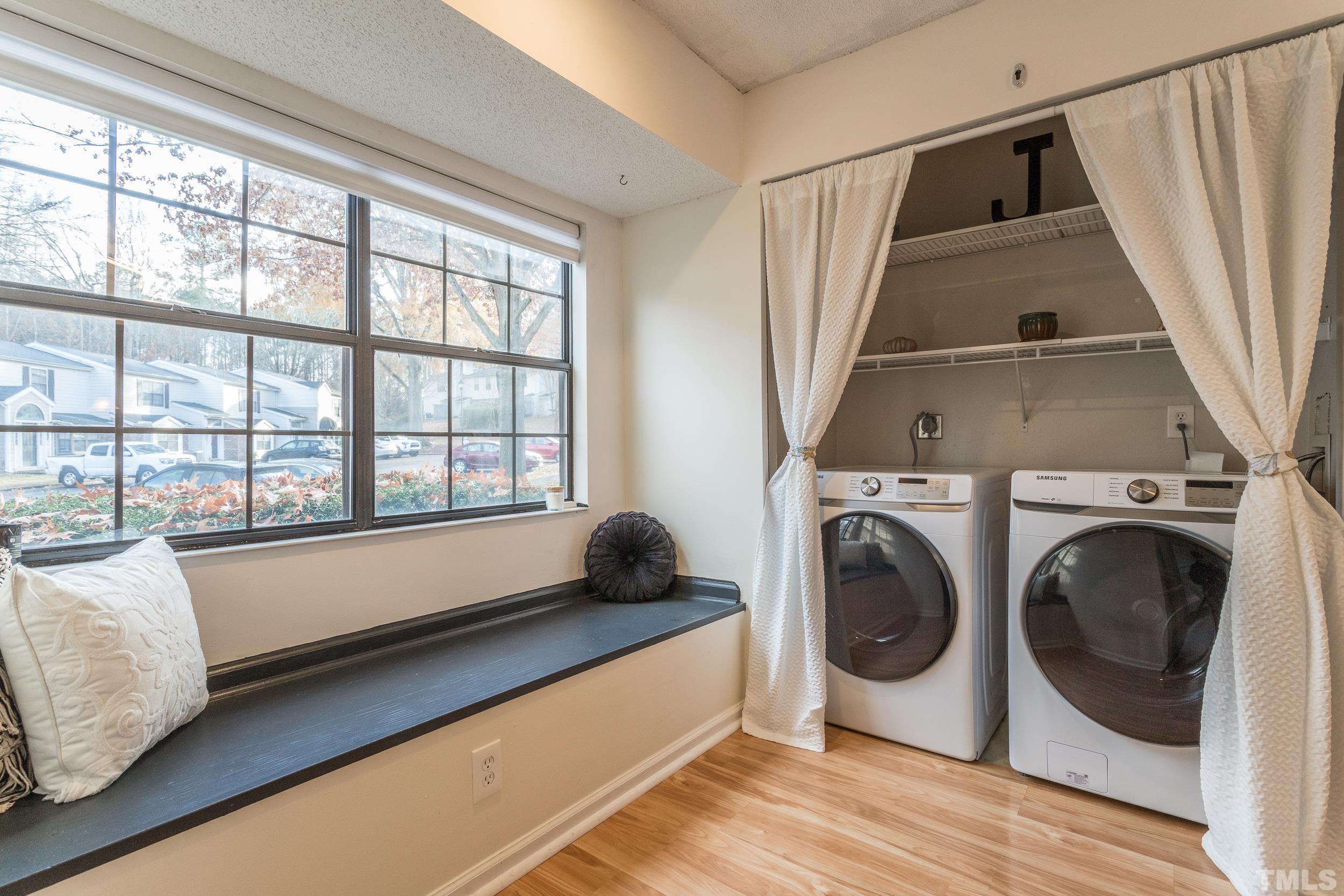 7808 Falcon Rest Circle Raleigh, NC 27615 - Photo 17 of 28 a utility room with dryer and washer