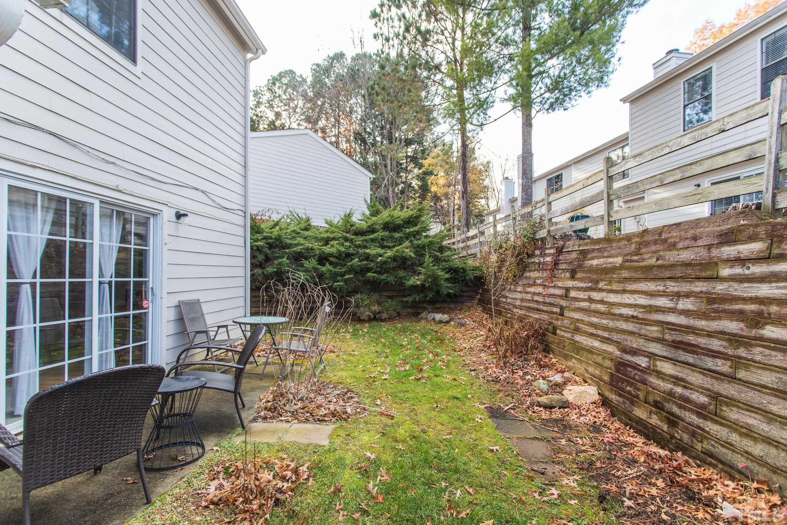7808 Falcon Rest Circle Raleigh, NC 27615 - Photo 24 of 28 a view of a two chairs in the patio