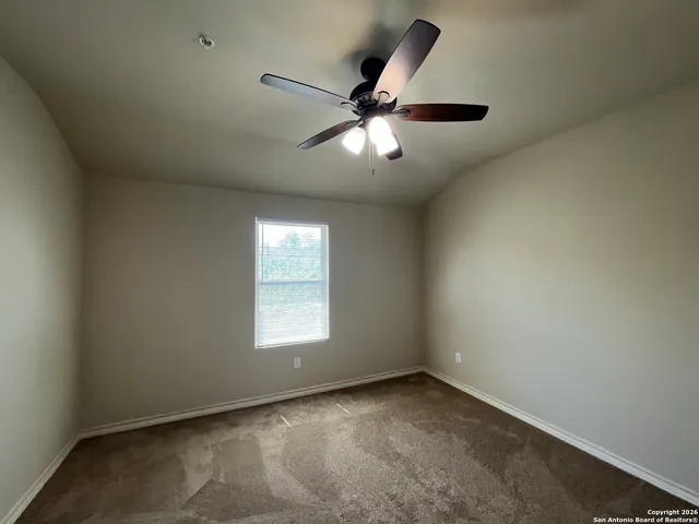 a bathroom with a sink a toilet and tub