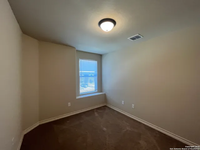 a bathroom with a white bath tub