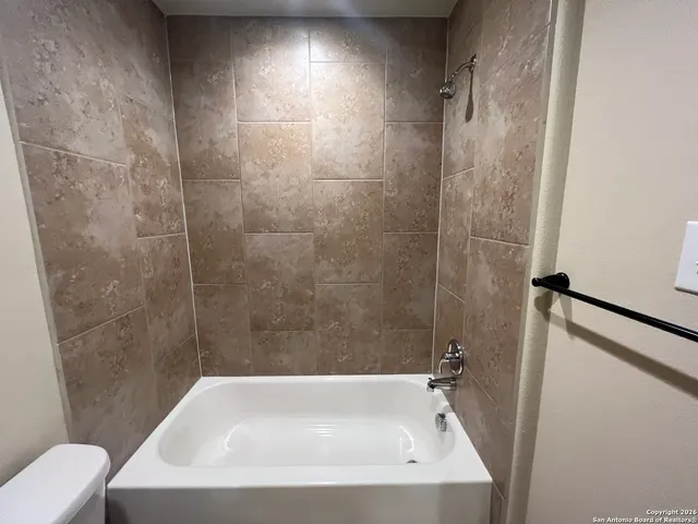 a bathroom with a sink and a toilet