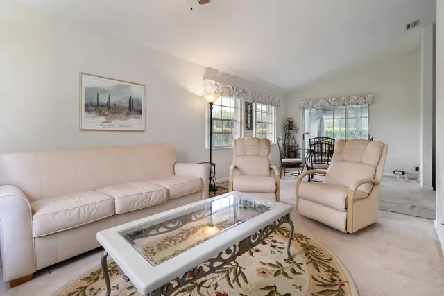 a living room with furniture and a couch