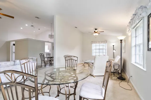 a view of a dining room with furniture