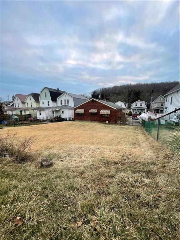 417 North 6th Avenue Butler, PA 16001 - Photo 3 of 25 a view of a lake with houses in the back