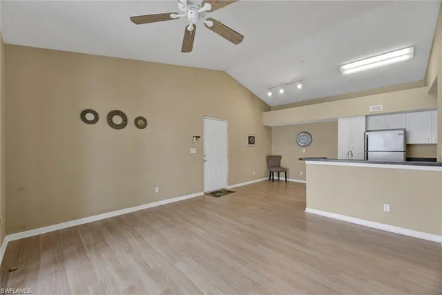 a view of a livingroom with wooden floor