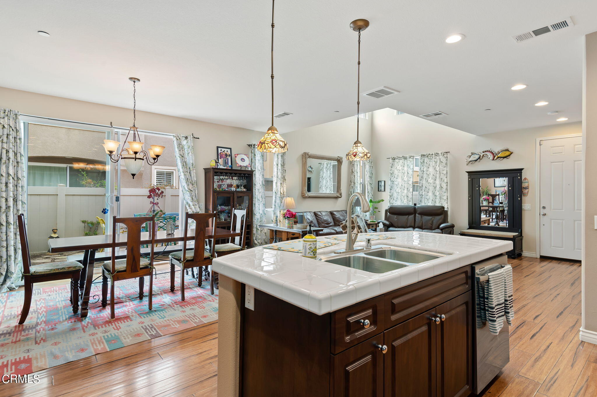 3630 Jolly Roger Way Oxnard, CA 93035 - Photo 12 of 24 a kitchen with center island table and chairs