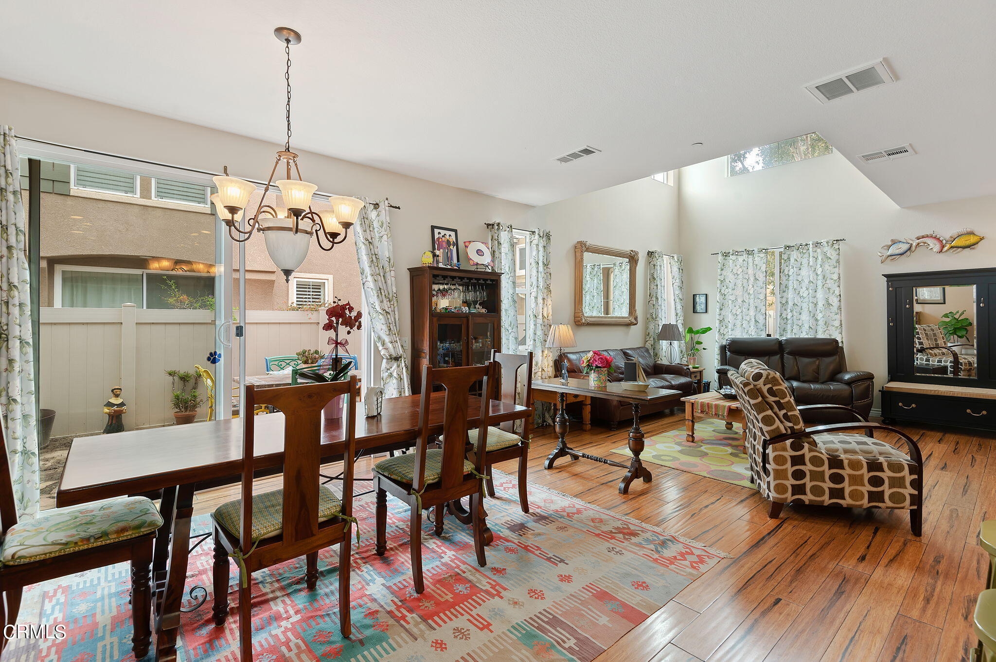 3630 Jolly Roger Way Oxnard, CA 93035 - Photo 13 of 24 a living room with furniture and a chandelier
