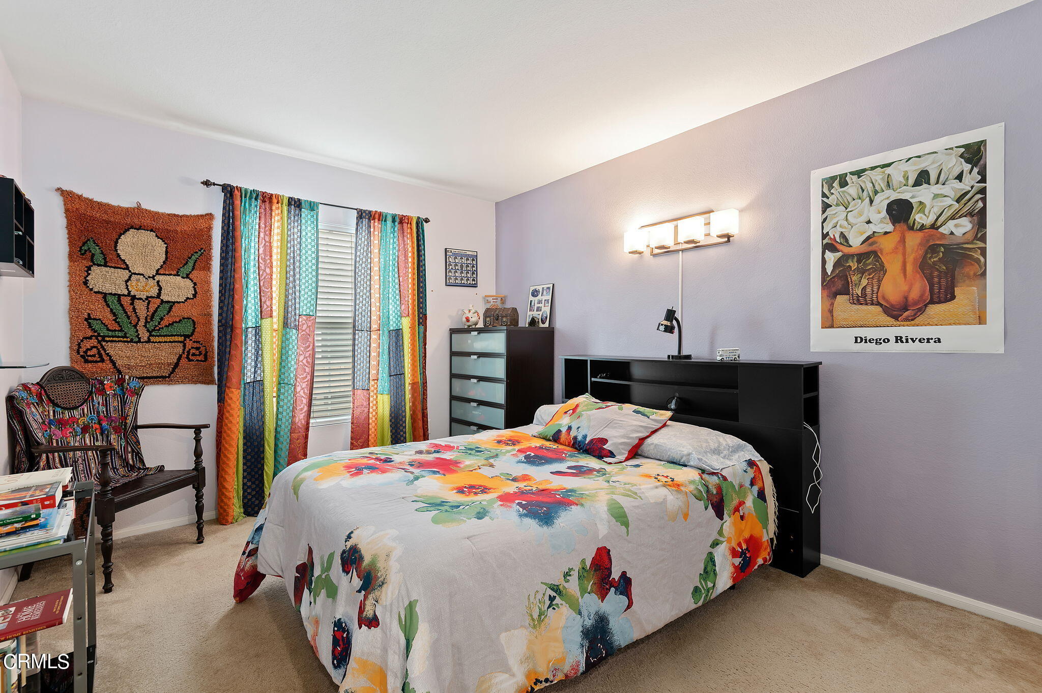 3630 Jolly Roger Way Oxnard, CA 93035 - Photo 19 of 24 a bedroom with a bed a dresser and a large mirror