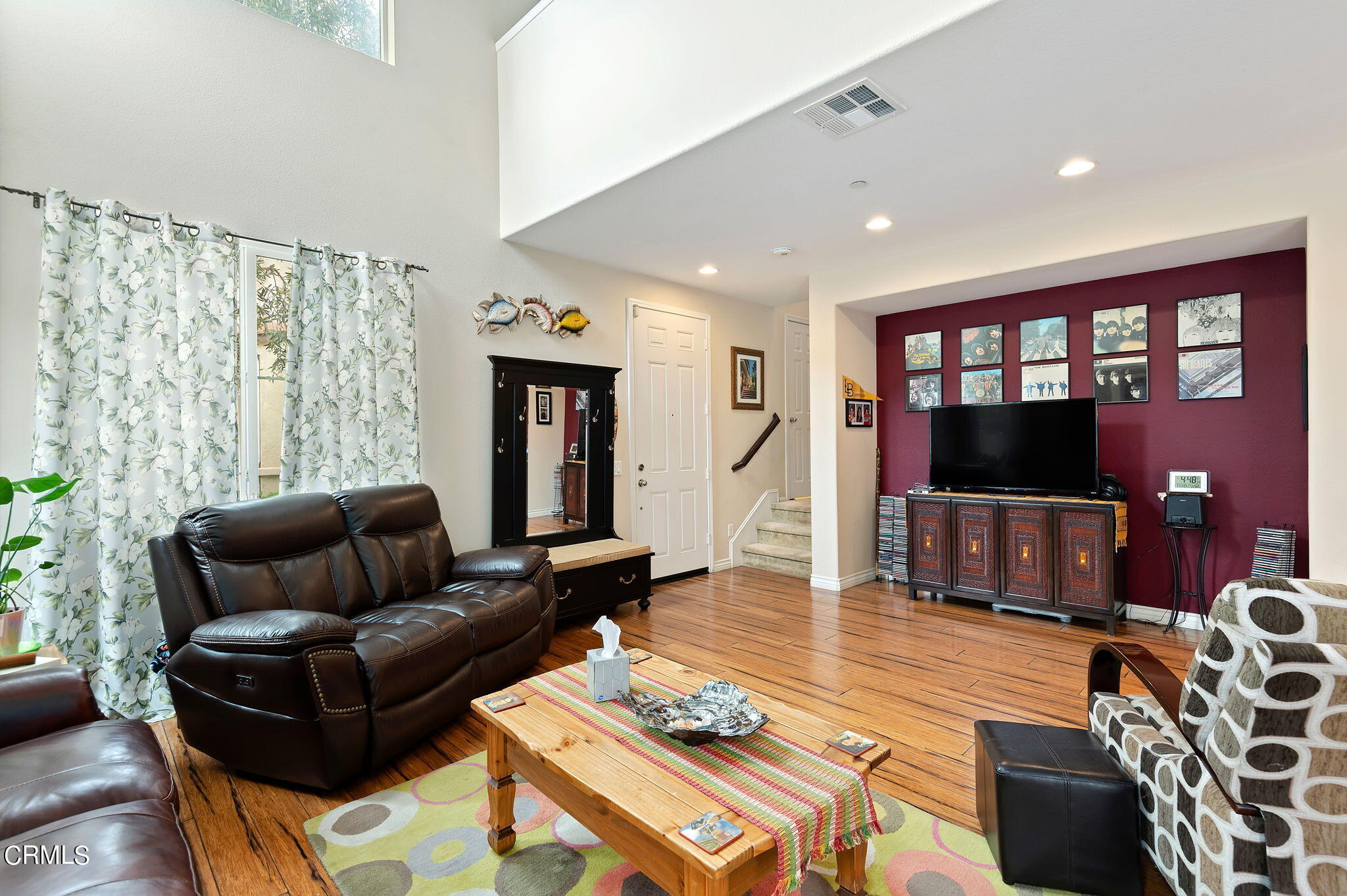 3630 Jolly Roger Way Oxnard, CA 93035 - Photo 6 of 24 a living room with furniture and a flat screen tv