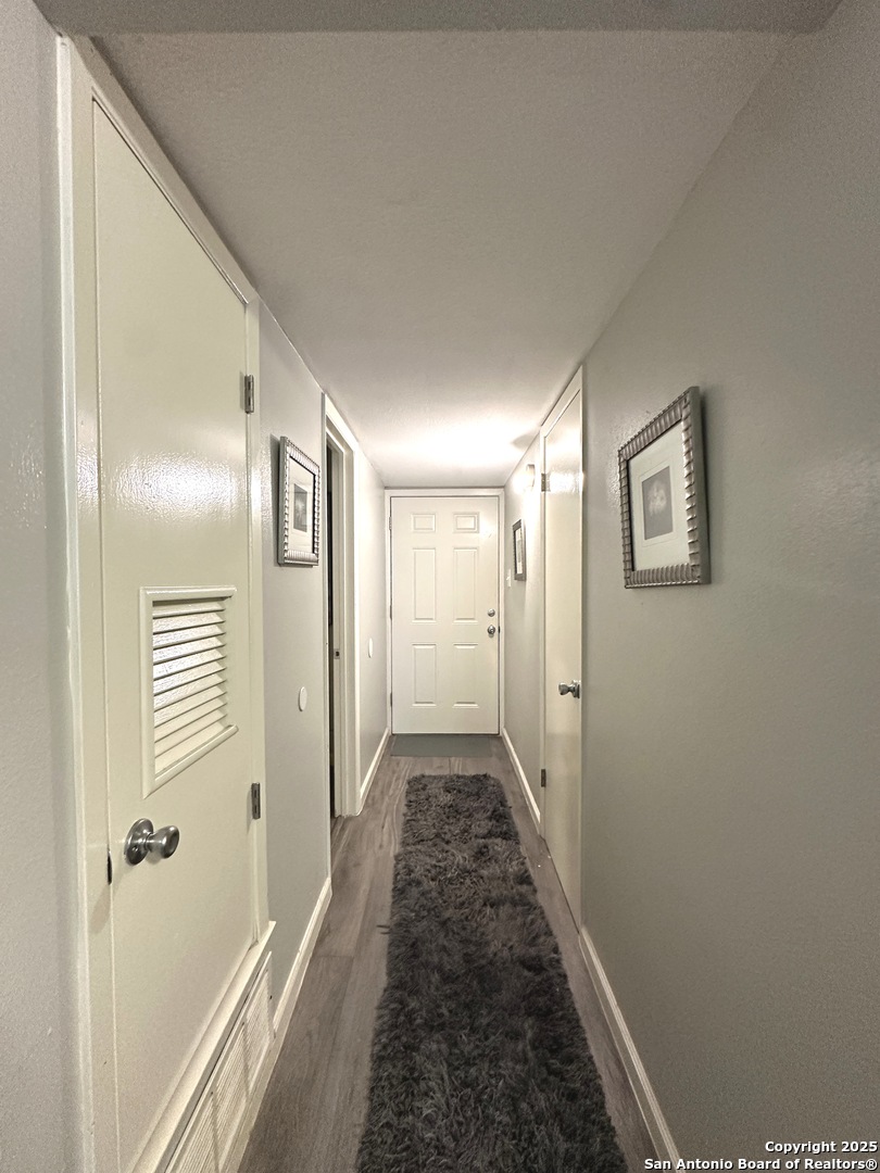 911 Vance Jackson Road, Unit Y San Antonio, TX 78201 - Photo 12 of 40 a view of hallway with wooden floor