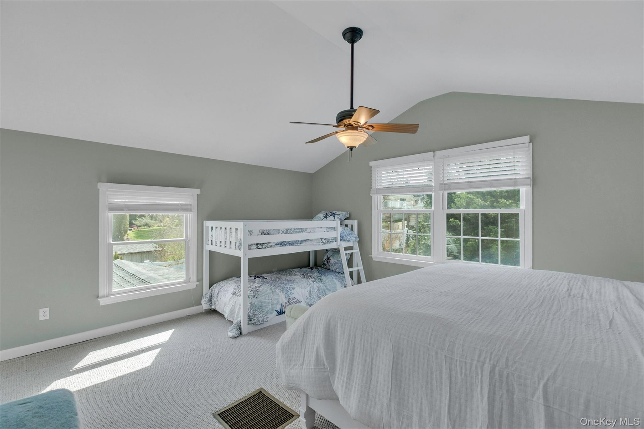 345 Colonial Road Southold, NY 11971 - Photo 26 of 43 a bedroom with furniture and a window