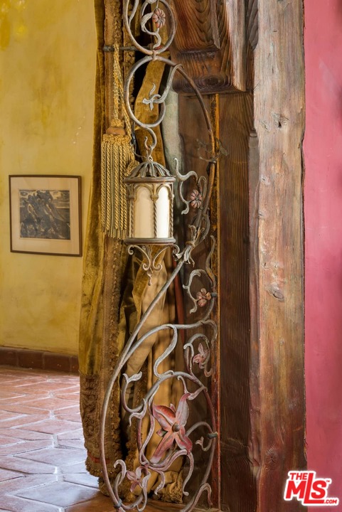 17520 Revello Drive Pacific Palisades, CA 90272 - Photo 19 of 51 a view of a door with wooden floor