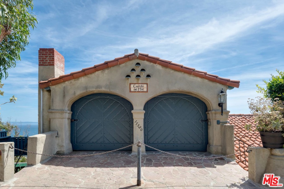 17520 Revello Drive Pacific Palisades, CA 90272 - Photo 3 of 51 a front view of a house