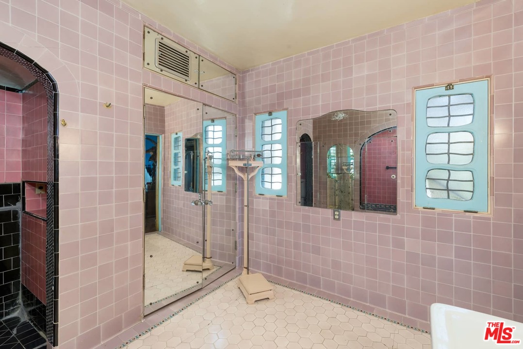 17520 Revello Drive Pacific Palisades, CA 90272 - Photo 34 of 51 a bathroom with a shower