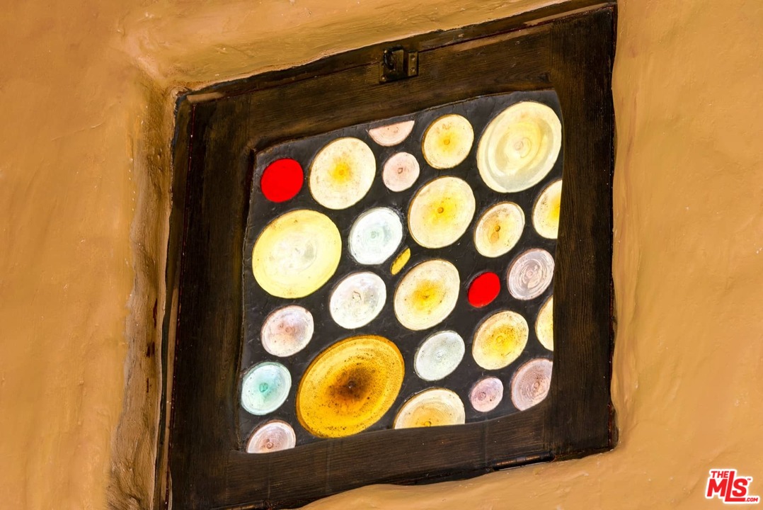 17520 Revello Drive Pacific Palisades, CA 90272 - Photo 39 of 51 a bathroom with a sink and a mirror