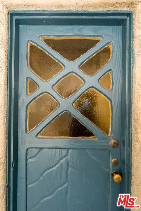 17520 Revello Drive Pacific Palisades, CA 90272 - Photo 41 of 51 a close up of a sink and a mirror