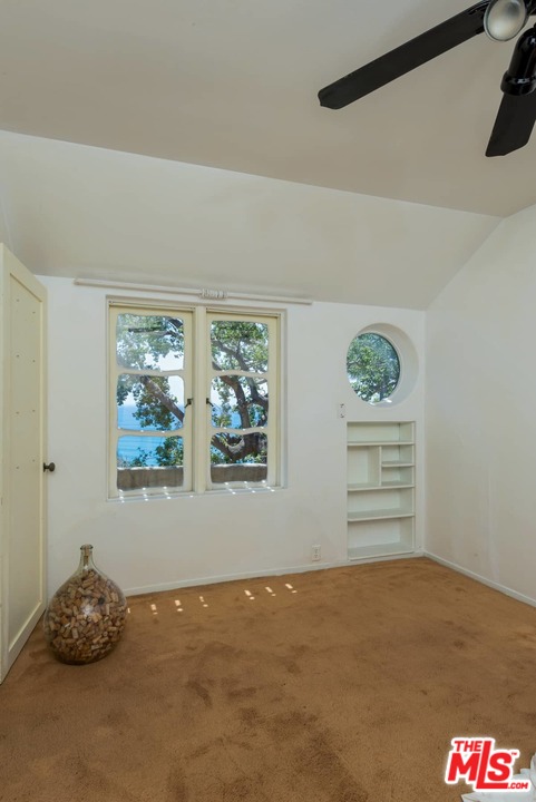 17520 Revello Drive Pacific Palisades, CA 90272 - Photo 42 of 51 a view of a big room with an empty space and a window