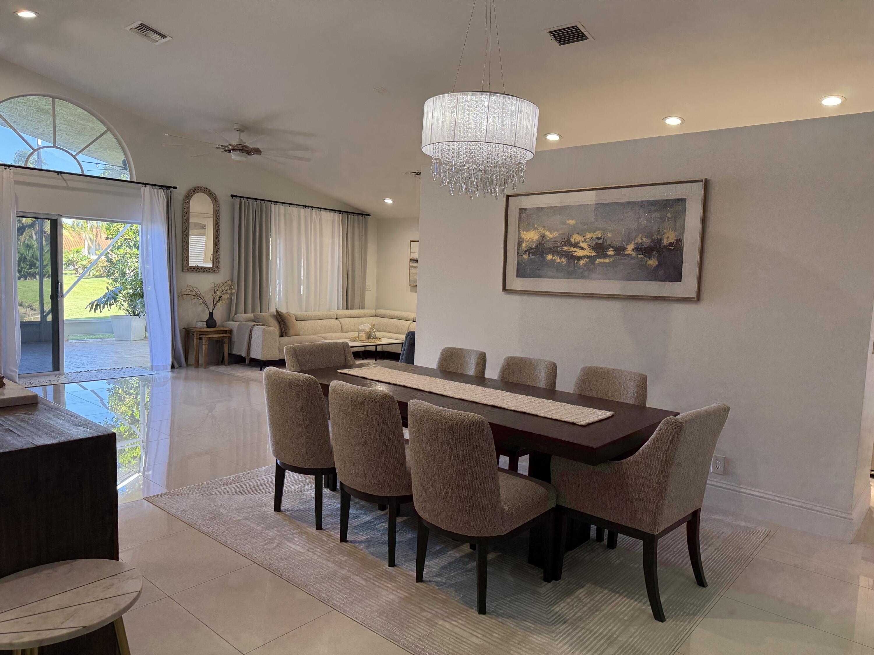 5325 Bodega Place Delray Beach, FL 33484 - Photo 10 of 40 a view of a dining room with furniture