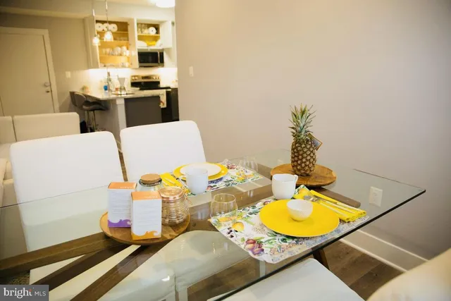 a view of hallway with wooden floor