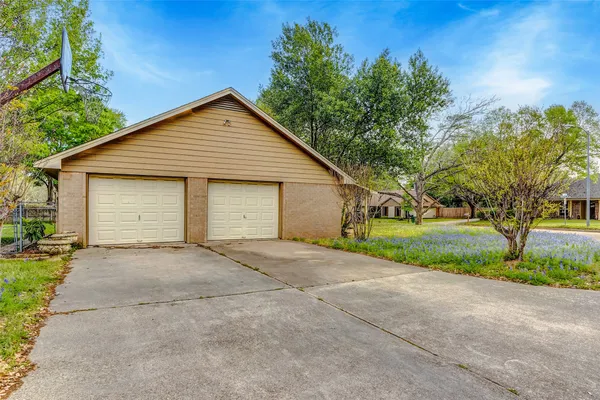 front view of a house and a yard