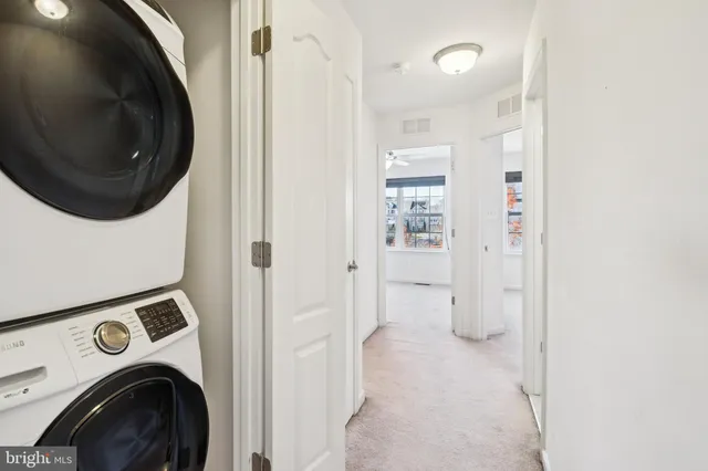 a view of a storage & utility room with a washer and dryer