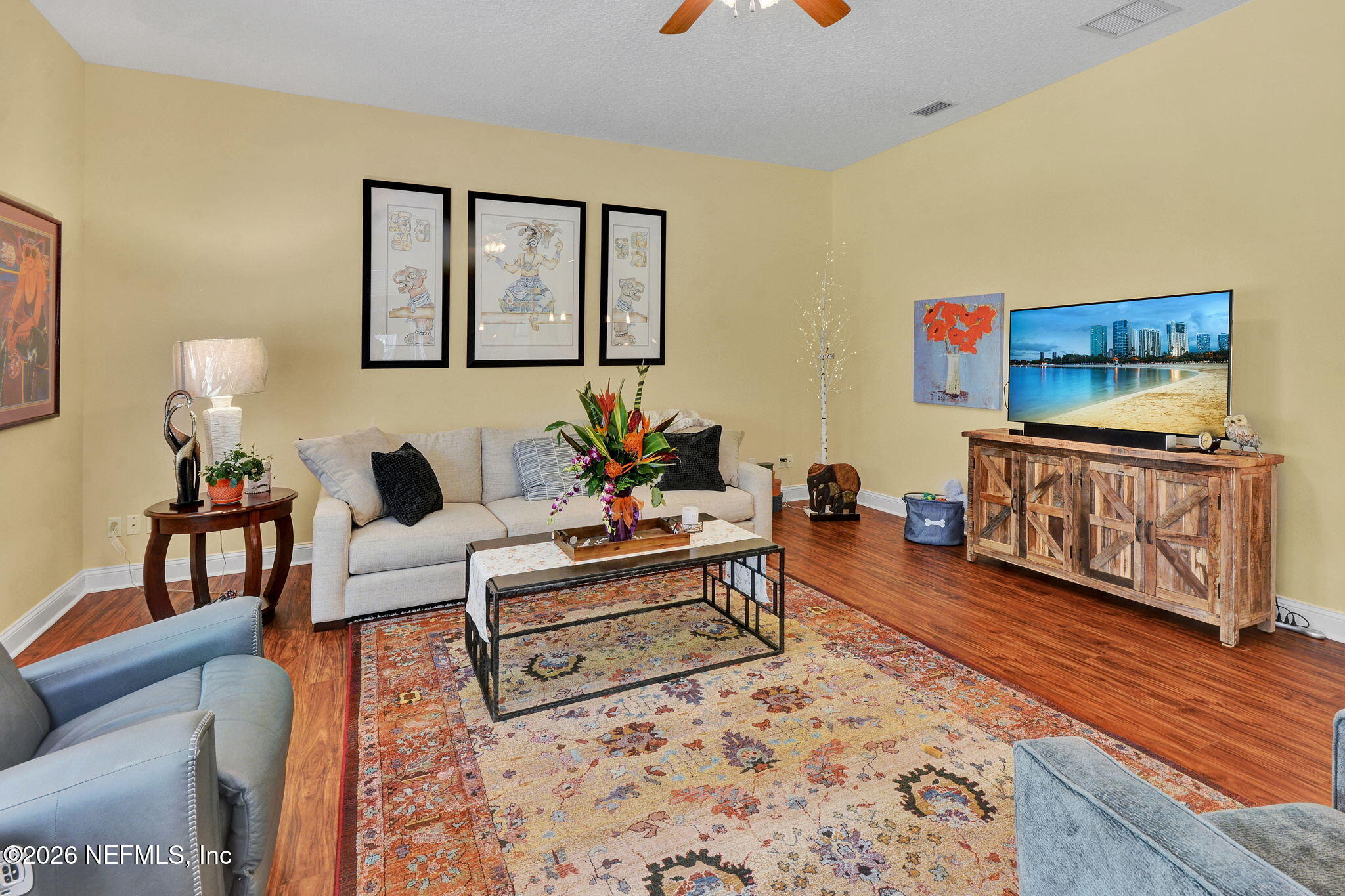 5950 West Shores Road Orange Park, FL 32003 - Photo 20 of 42 a living room with furniture and a wooden floor