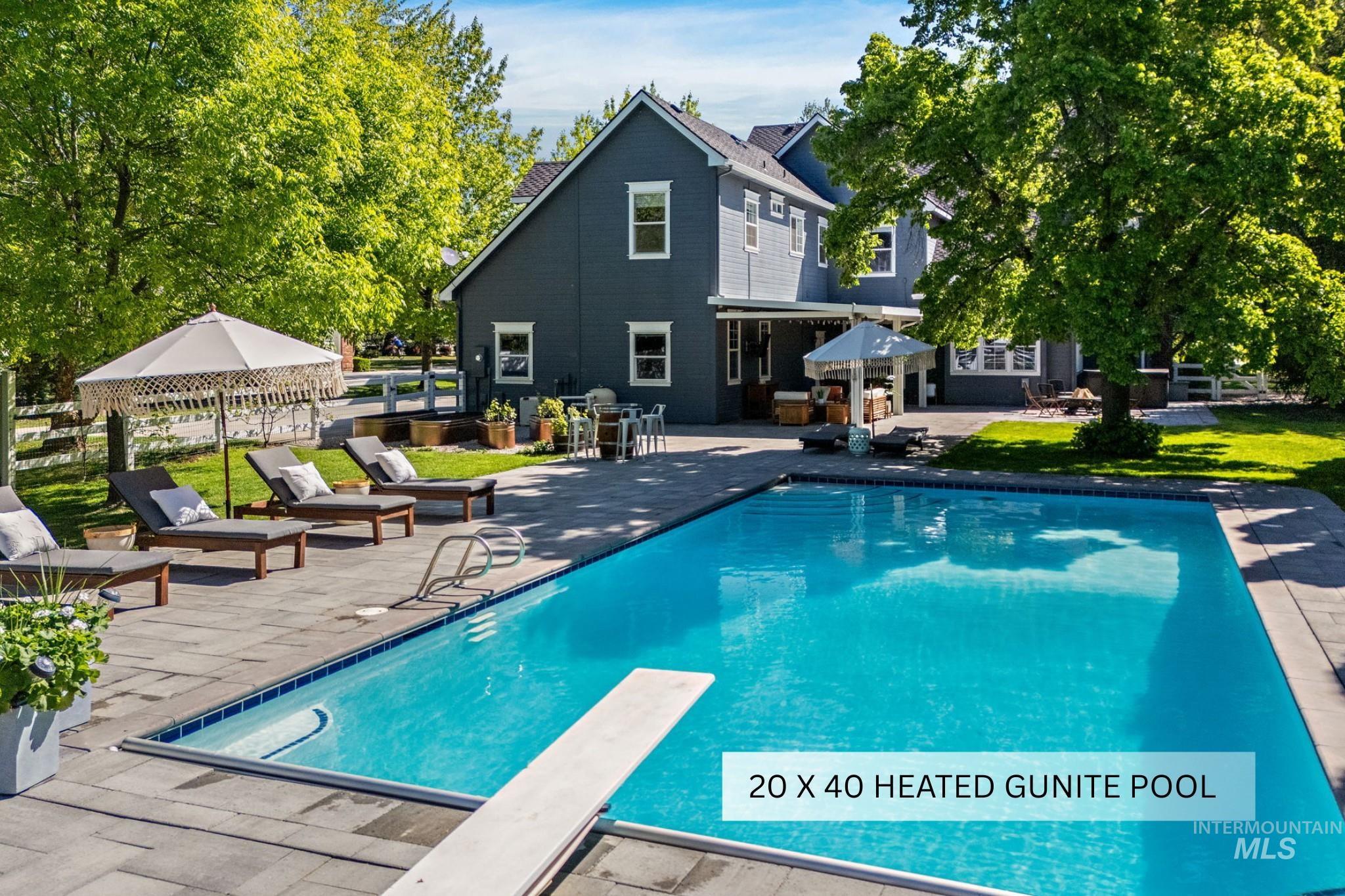 515 North Sierra View Way Eagle, ID 83616 - Photo 37 of 50 Outdoor pool featuring a patio area and a diving board