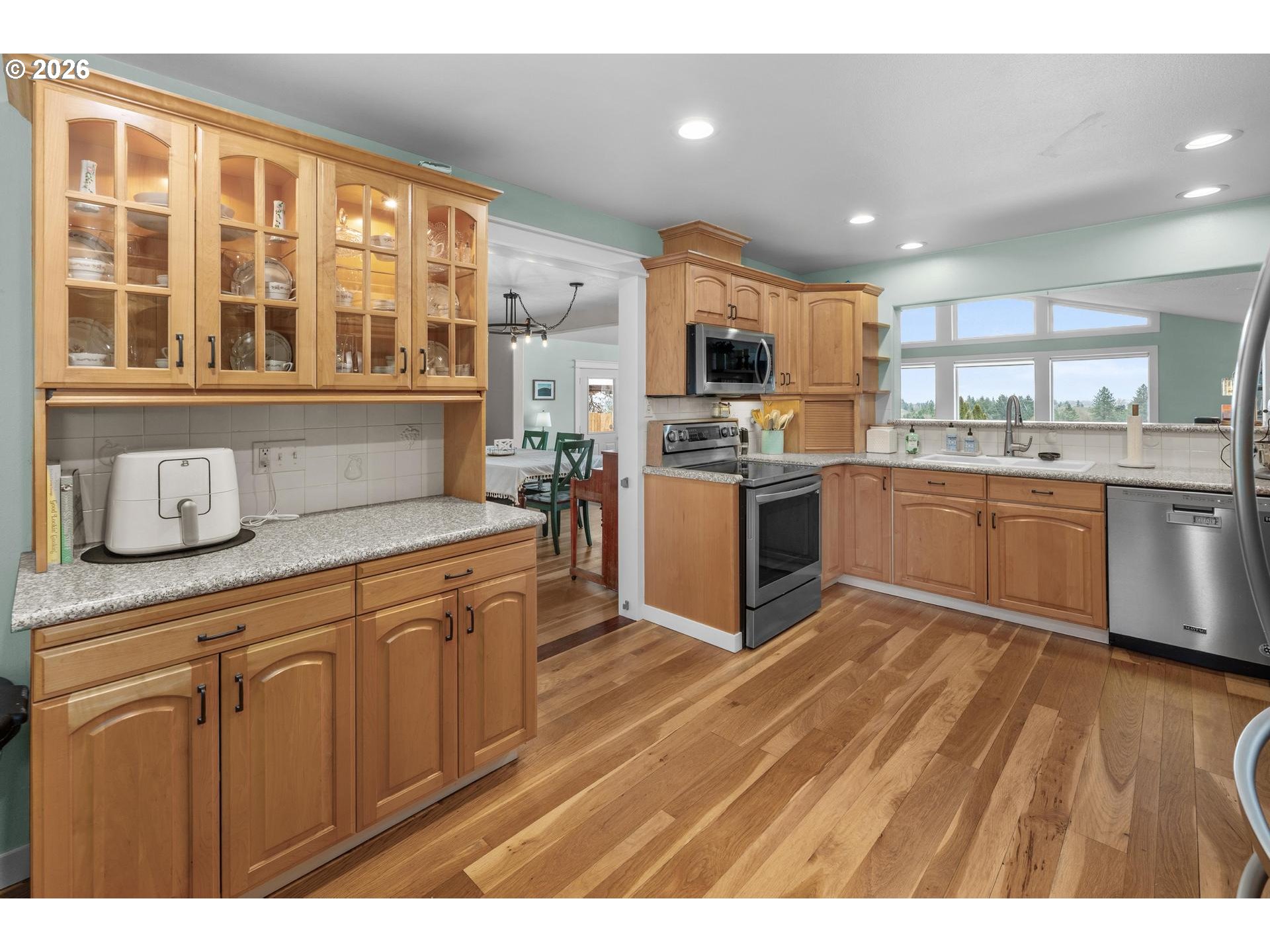 35254 Pittsburg Road St. Helens, OR 97051 - Photo 11 of 38 a kitchen with stainless steel appliances granite countertop a stove and a sink