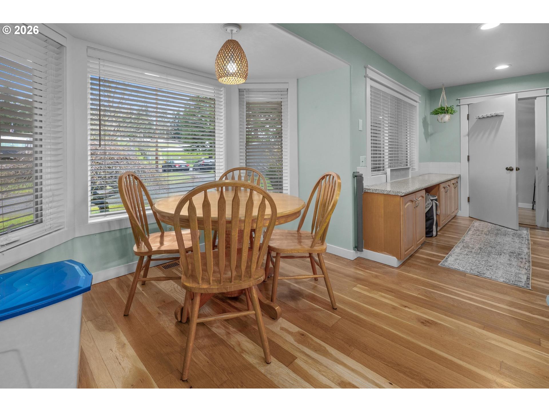35254 Pittsburg Road St. Helens, OR 97051 - Photo 13 of 38 a view of a dining room with furniture and wooden floor