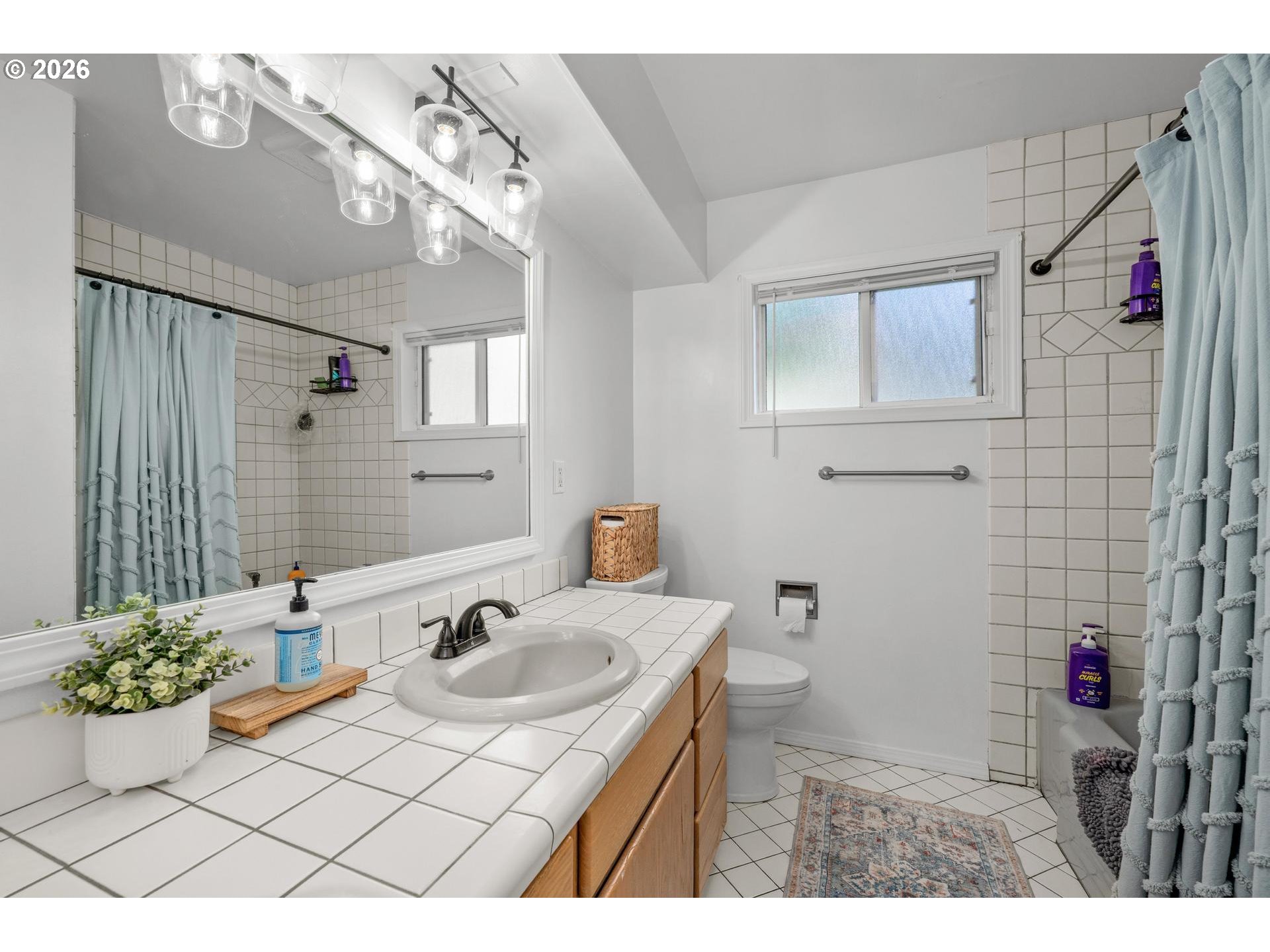 35254 Pittsburg Road St. Helens, OR 97051 - Photo 16 of 38 a bathroom with a sink vanity mirror and toilet