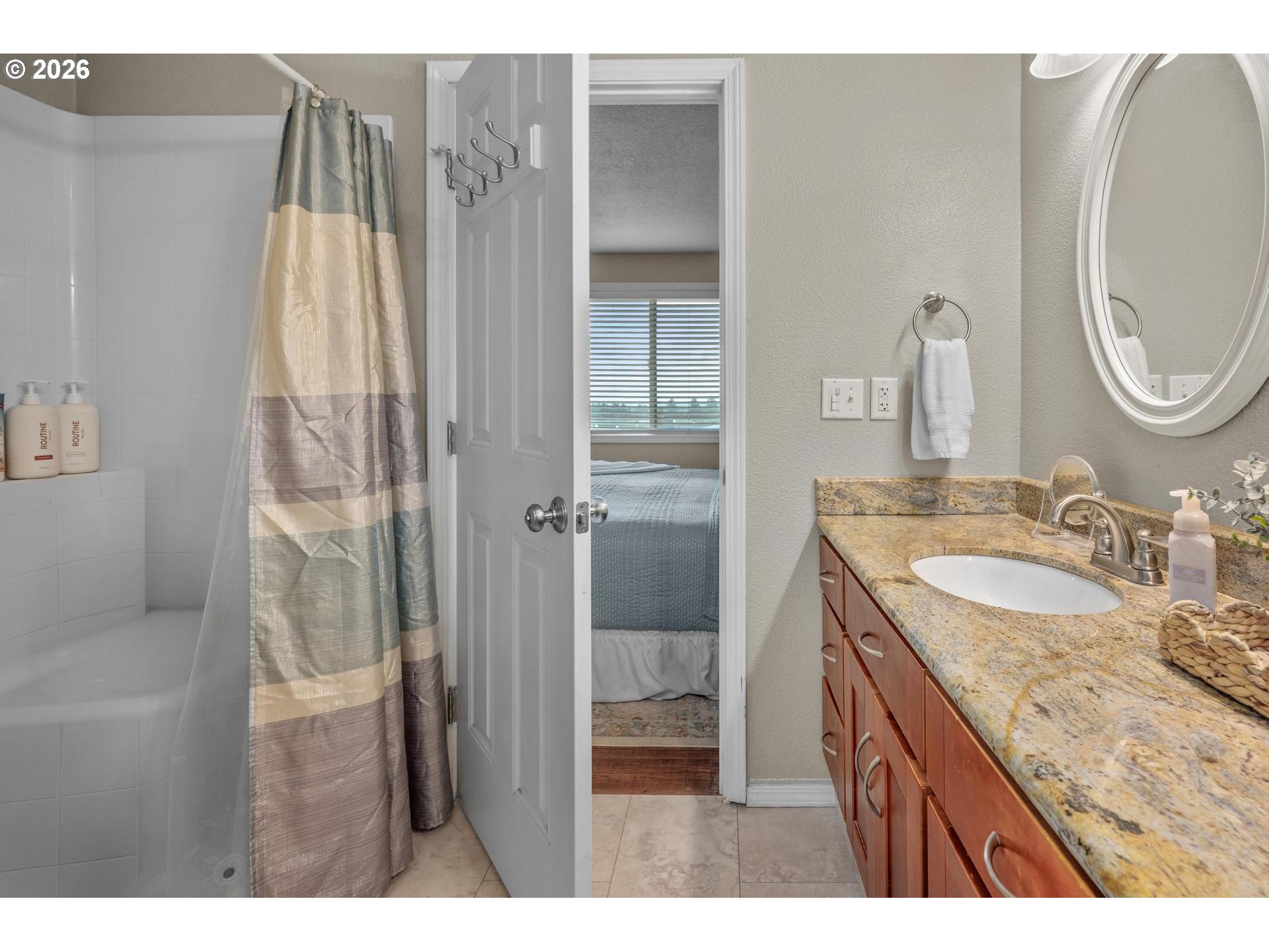35254 Pittsburg Road St. Helens, OR 97051 - Photo 24 of 38 a bathroom with a granite countertop sink a mirror and shower