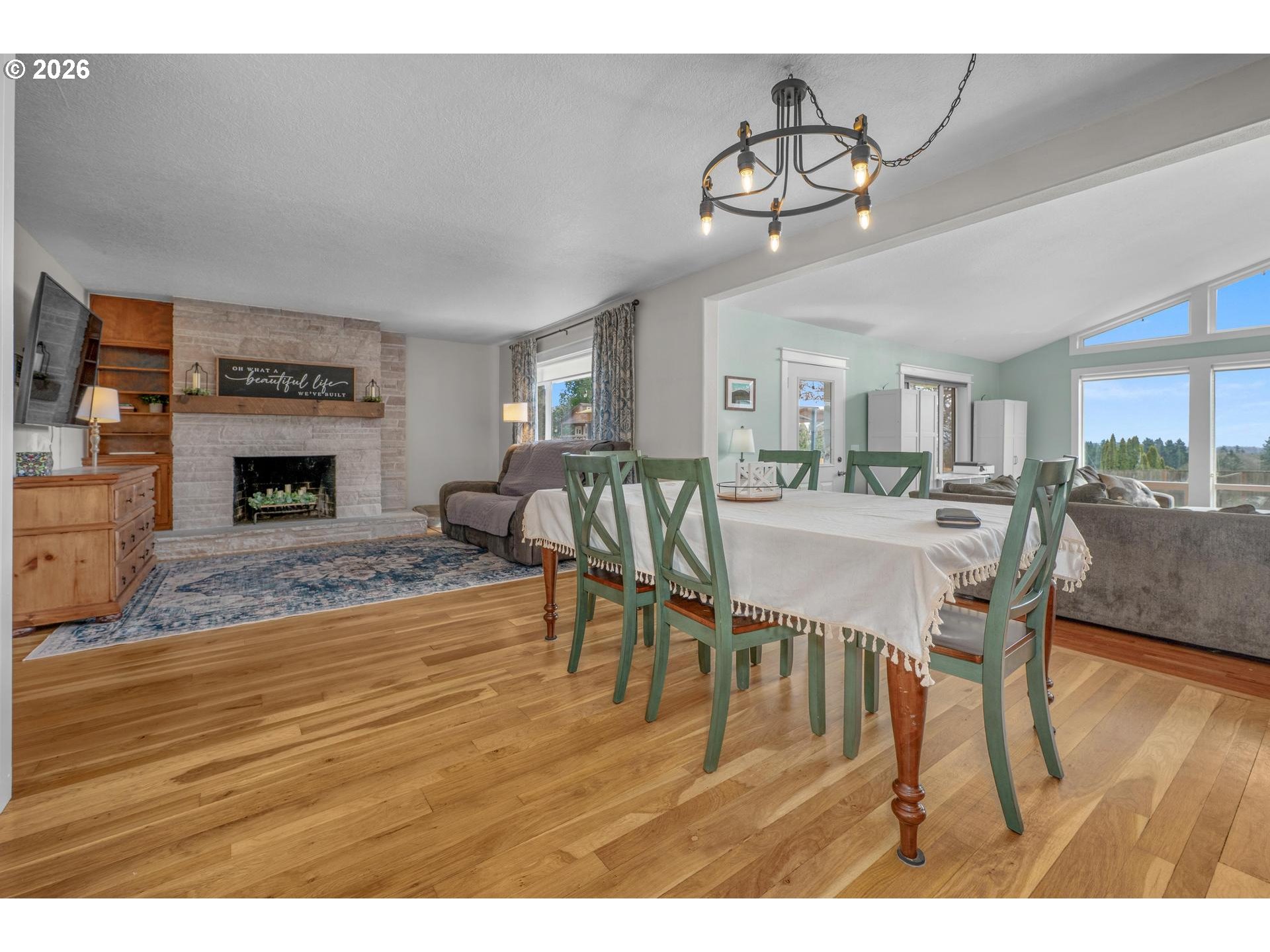 35254 Pittsburg Road St. Helens, OR 97051 - Photo 7 of 38 a view of a dining room with furniture and wooden floor