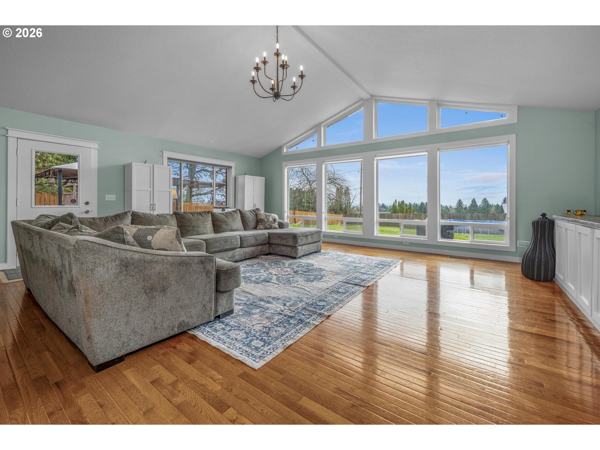 35254 Pittsburg Road St. Helens, OR 97051 - Photo 9 of 38 a living room with furniture and a floor to ceiling window