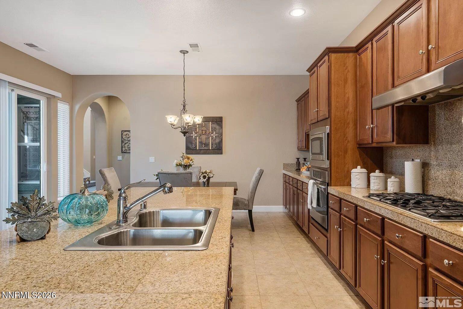 10885 Pentwater Drive Reno, NV 89521 - Photo 18 of 64 10885 Pentwater Pic Kitchen 3