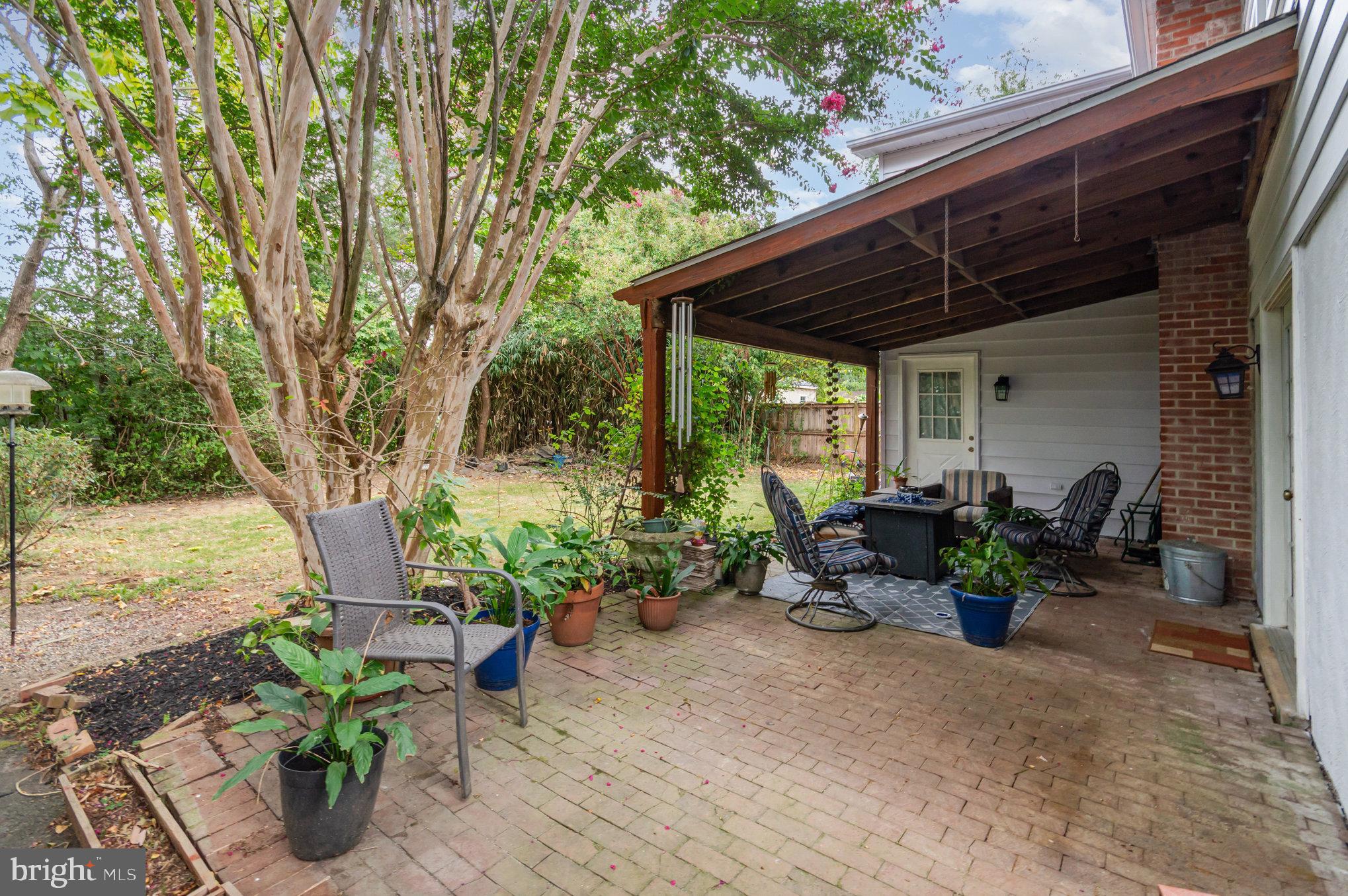 309 Williamsburg Road Sterling, VA 20164 - Photo 2 of 30 a view of a chairs and table in the patio
