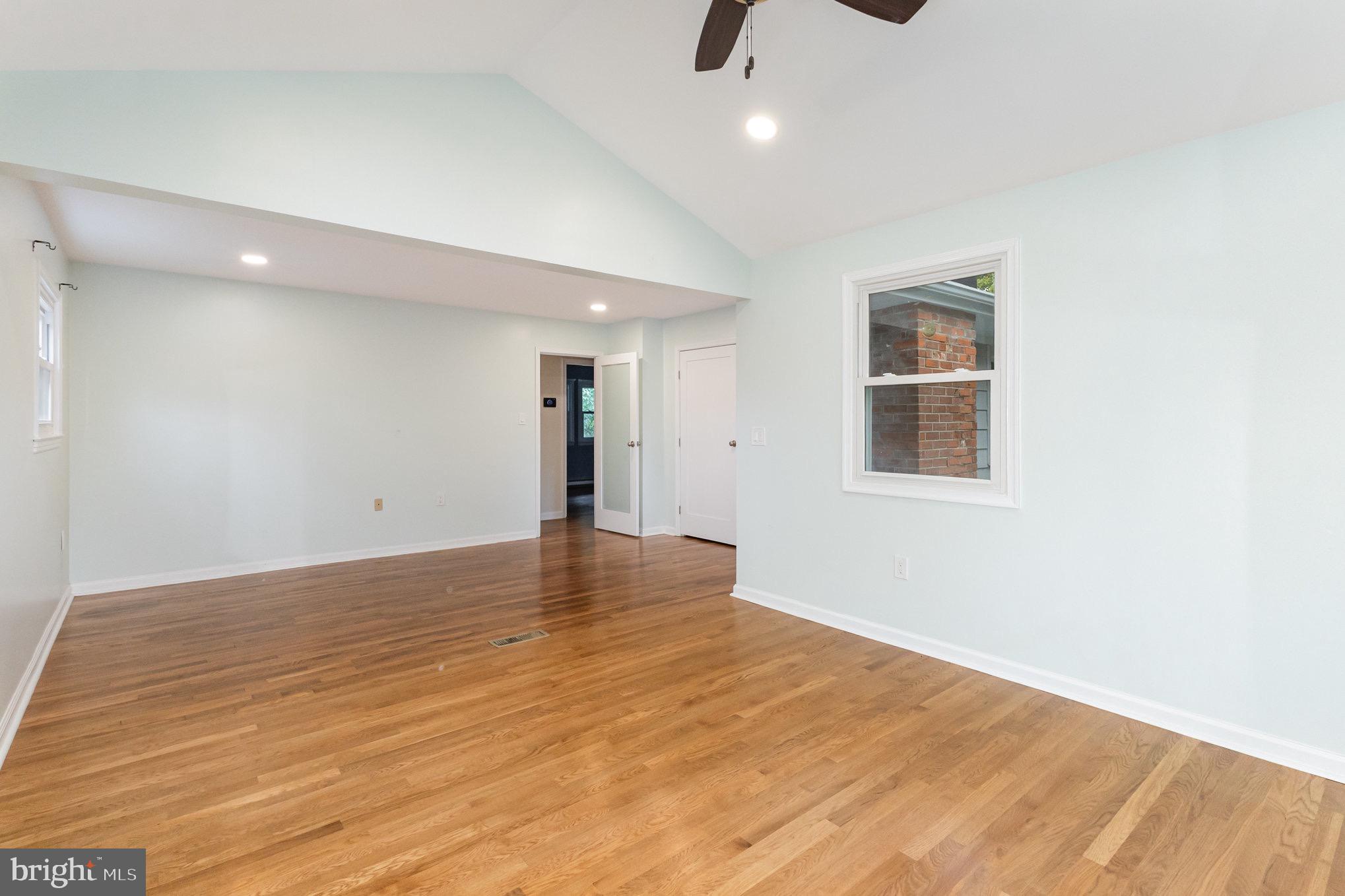 309 Williamsburg Road Sterling, VA 20164 - Photo 30 of 30 wooden floor in an empty room with a window