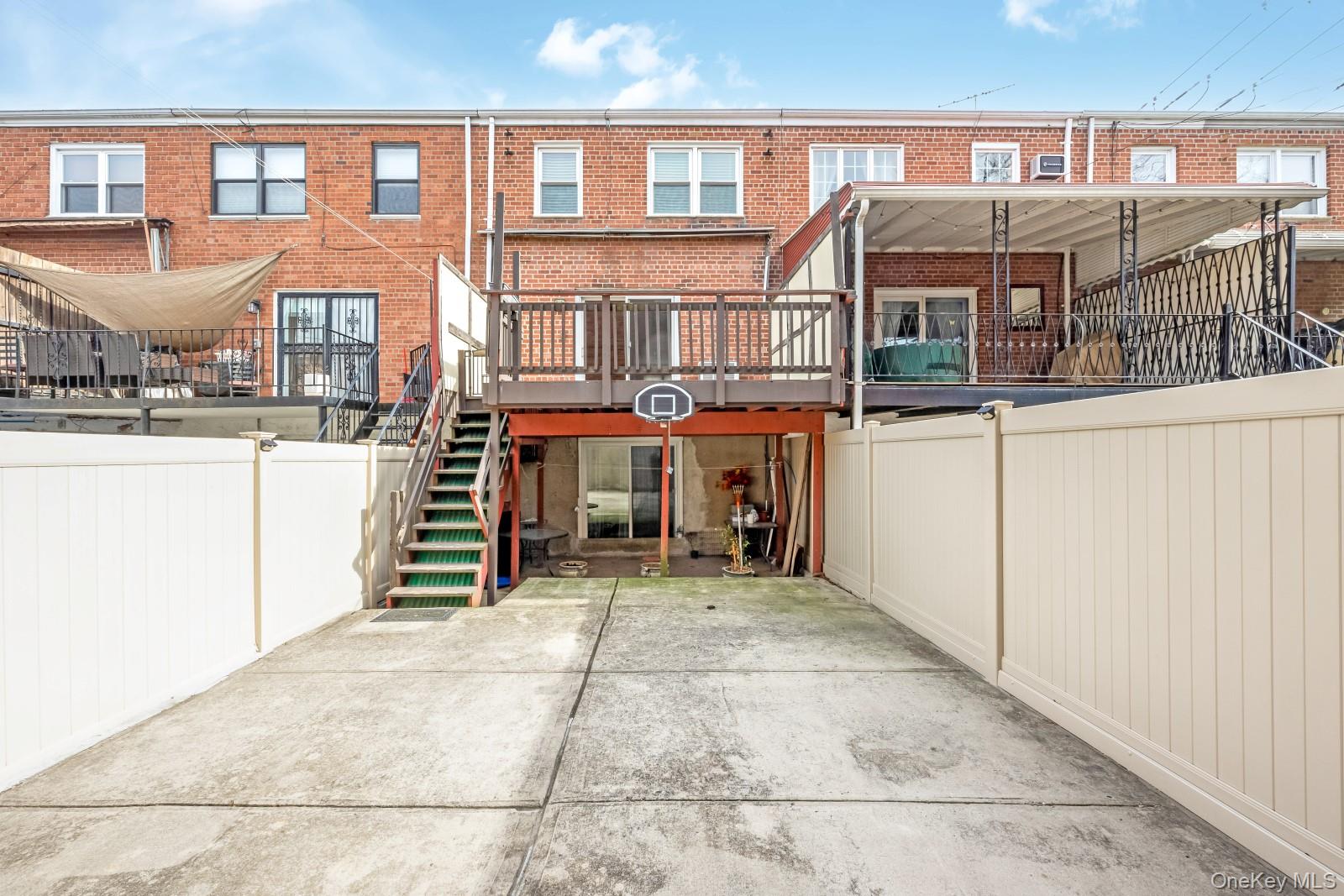 69-05 61st Road Queens, NY 11379 - Photo 31 of 31 a view of a brick building with many windows