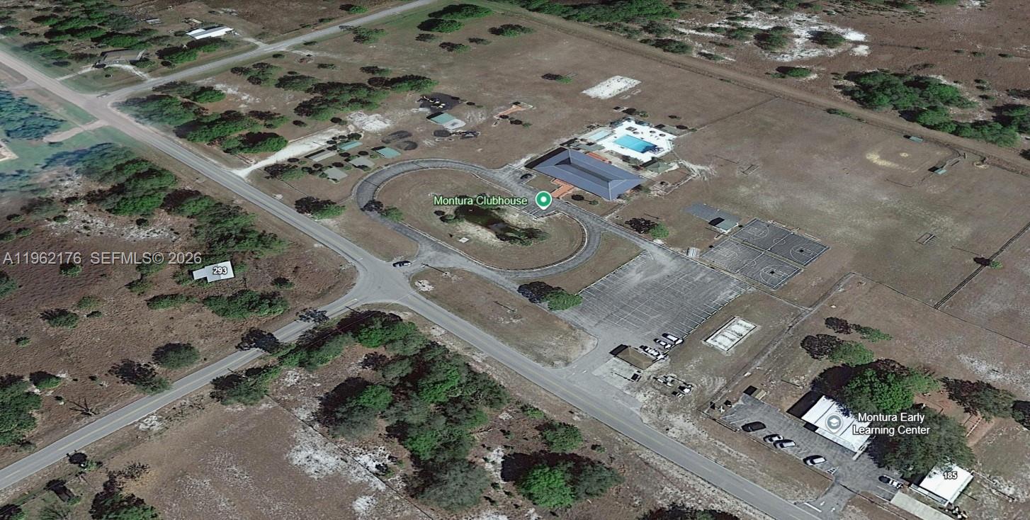 665 South Palm Street Clewiston, FL 33440 - Photo 23 of 33 Clubhouse Aerial