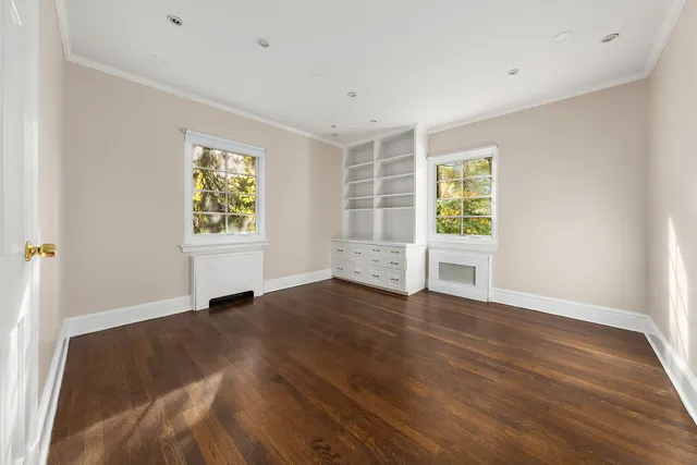 a bathroom with a shower a sink and toilet