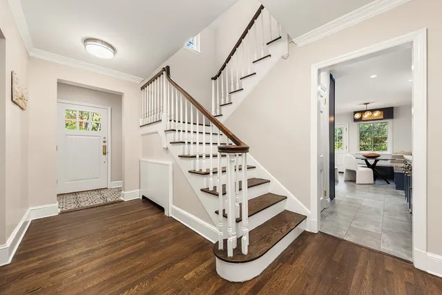 a kitchen with a table and chairs in it