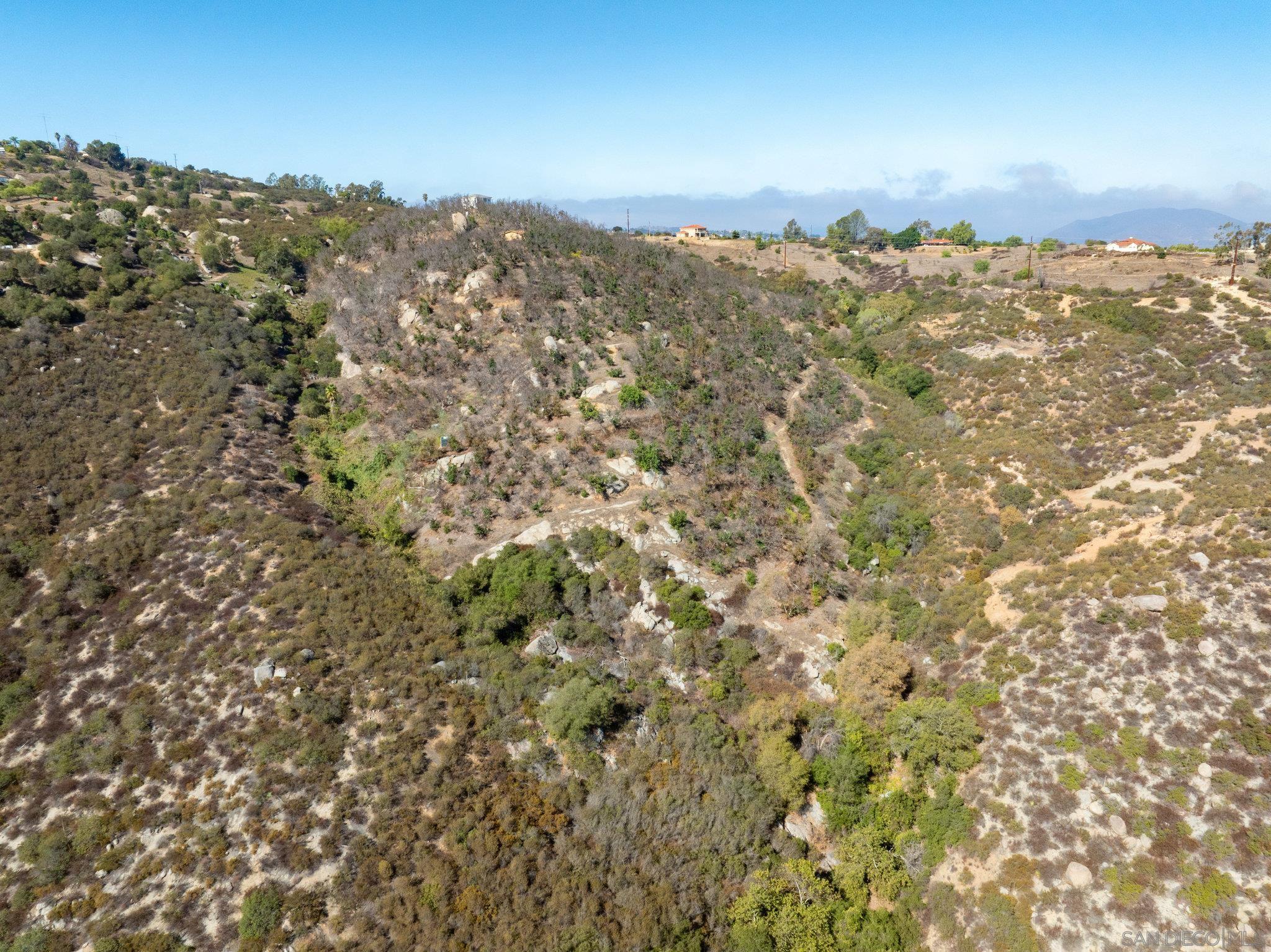 0 Pauma Heights Road Valley Center, CA 92082 - Photo 17 of 24 an aerial view of houses covered in trees