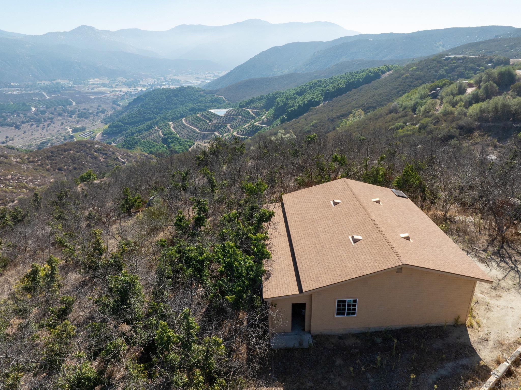 0 Pauma Heights Road Valley Center, CA 92082 - Photo 7 of 24 an aerial view of a house with a mountain view