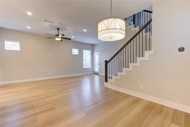 a view of entryway with wooden floor