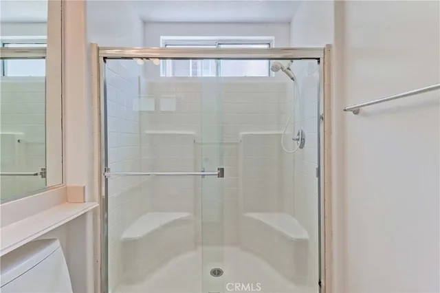 a view of storage and utility room with racks on the wall