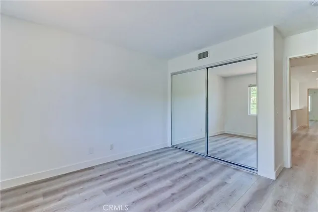 a view of a backyard with potted plants