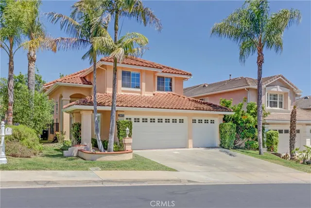 a view of a pathway with flower pots