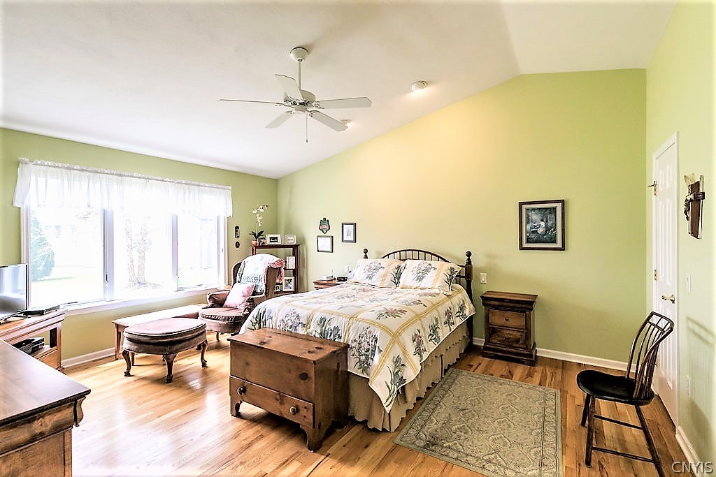 231 Oarlock Circle Manlius, NY 13057 - Photo 18 of 35 The main bedroom features a walk in closet and ful