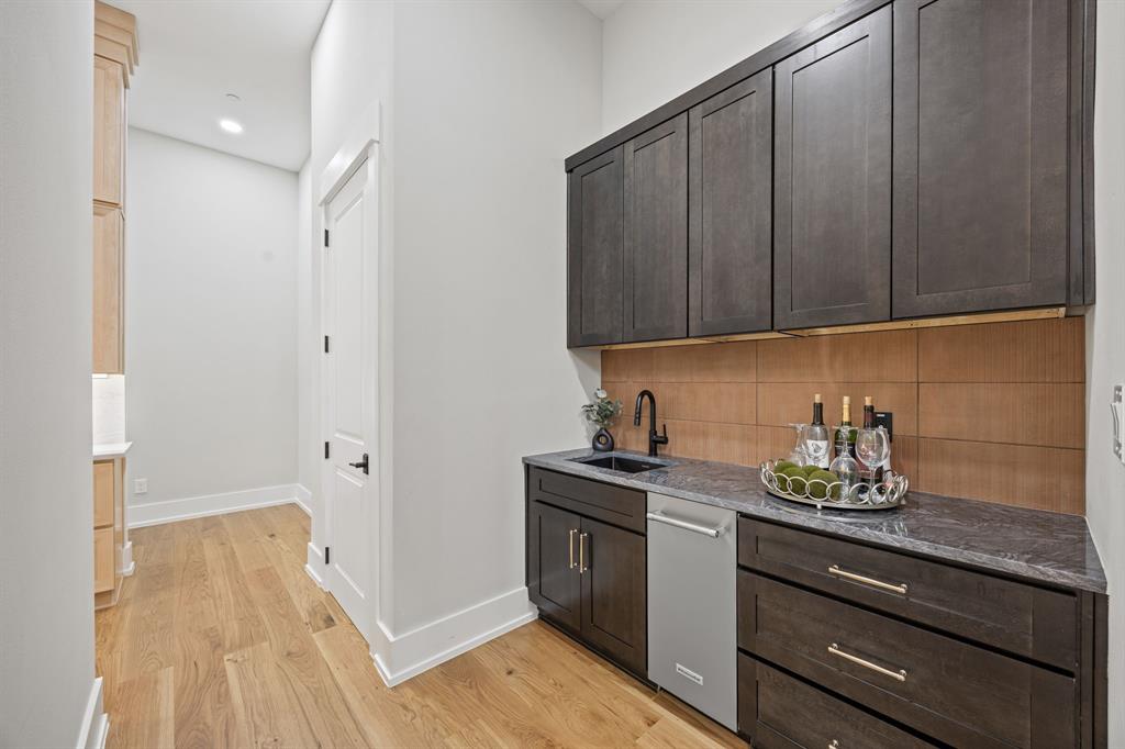 4208 Allencrest Lane Dallas, TX 75244 - Photo 11 of 40 a kitchen with a sink and cabinets
